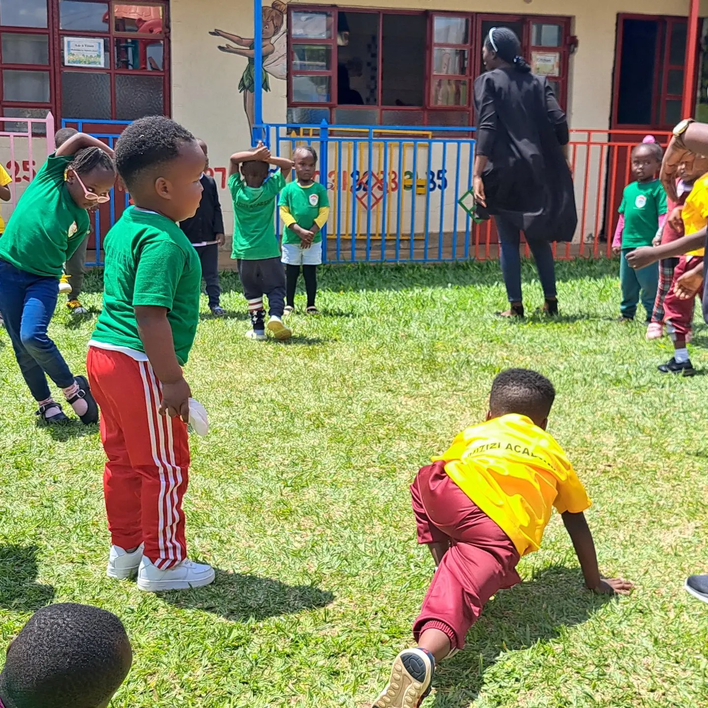 Physical education class at Mizizi Academy, promoting active learning